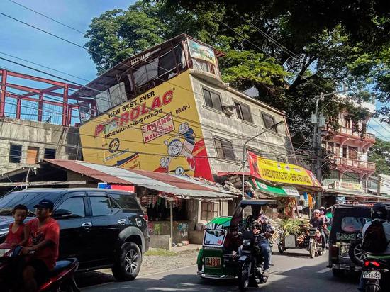 A house is seen tilting on its side after an earthquake in Abra Province, the Philippines, July 27, 2022. (Abra local government unit/Handout via Xinhua)