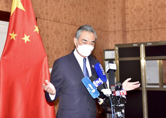 State Councilor and Foreign Minister Wang Yi speaks at a press conference in Phnom Penh, August 5, 2022. (Photo/Xinhua)