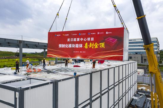 The Wuhan Supercomputing Center, China's largest container-like computing facility, is close to completion in Wuhan, Hubei province. (Photo by WEI LAI/FOR CHINA DAILY)