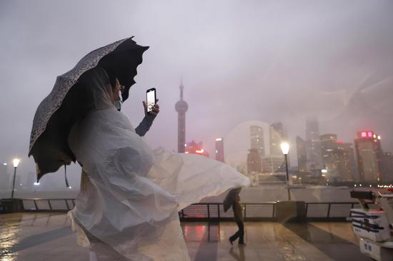 Shanghai switches off landscape lights as Typhoon Hinnamnor approaches