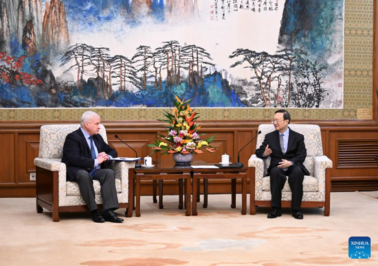 Yang Jiechi, a member of the Political Bureau of the Communist Party of China (CPC) Central Committee and director of the Office of the Foreign Affairs Commission of the CPC Central Committee, meets with Andrey Denisov, the outgoing Russian Ambassador to China, in Beijing, capital of China, Sept. 12, 2022. (Xinhua/Xie Huanchi)