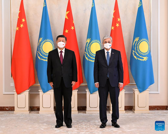 Chinese President Xi Jinping and Kazakh President Kassym-Jomart Tokayev pose for a photo before their formal talks, Sept. 14, 2022. Xi arrived in Nur-Sultan Wednesday afternoon and began his state visit to the Republic of Kazakhstan. (Xinhua/Rao Aimin)
