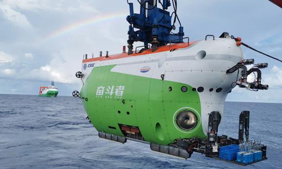 China sees two manned submersibles put into joint operation in deep sea for first time