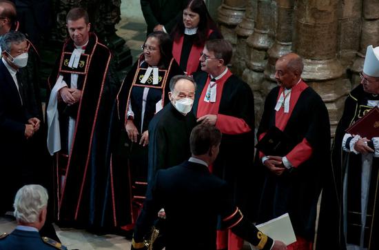 Chinese President Xi Jinping's Special Representative Vice President Wang Qishan attends the state funeral for Queen Elizabeth II held at Westminster Abbey, together with heads of state from various countries, members of the royal family and government representatives, in London, Britain, Sept. 19, 2022. (PA Wire/Handout via Xinhua)