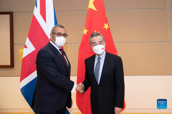 Chinese State Councilor and Foreign Minister Wang Yi meets with Britain's Secretary of State for Foreign, Commonwealth and Development Affairs James Cleverly on the sidelines of the ongoing 77th session of the UN General Assembly in New York, the United States, Sept. 20, 2022. (Photo by Liao Pan/Xinhua)