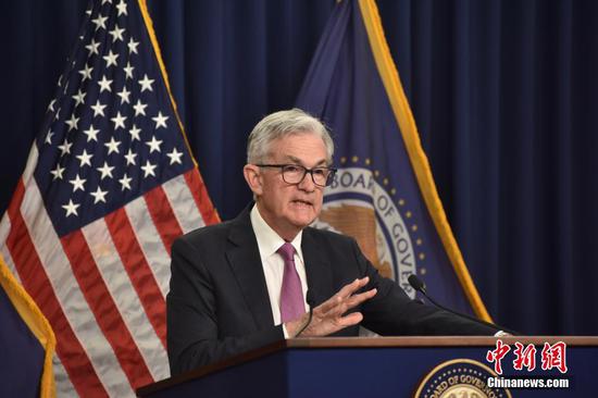 The U.S. Federal Reserve Chairman Jerome Powell answers questions at a press conference, July 27, 2022. The Federal Reserve of the U.S. announced to increase the fed funds rate by 75 basis points, July 27, 2022. (Photo/China News Service)