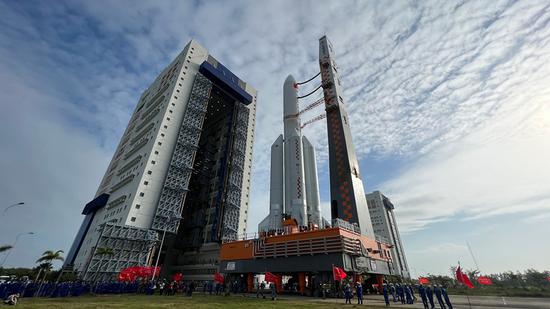 The combination of the Mengtian lab module and a Long March-5B Y4 carrier rocket arrives at the launchpad in south China's Hainan Province, October 25, 2022. (Zheng Yibing/CGTN)