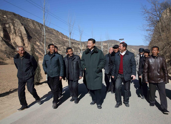 Xi Jinping visits Liangjiahe Village, northwest China's Shaanxi Province, Feb. 13, 2015. (Xinhua/Lan Hongguang)