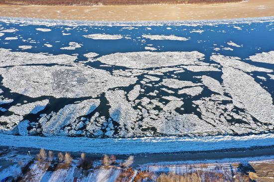 Crystal ice floats on Heilongjiang River