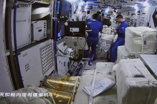 This screen image captured at Beijing Aerospace Control Center on Nov. 12, 2022 shows the inside view of the core module Tianhe after China's cargo spacecraft Tianzhou-5 conducting a fast automated rendezvous and docking with the combination of the space station Tiangong. (Photo by Sun Fengxiao/Xinhua)