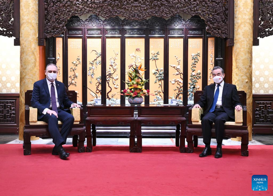 Chinese State Councilor and Foreign Minister Wang Yi, also a member of the Political Bureau of the Communist Party of China Central Committee, meets with new Russian Ambassador to China Igor Morgulov in Beijing, capital of China, Nov. 27, 2022. (Xinhua/Yan Yan)