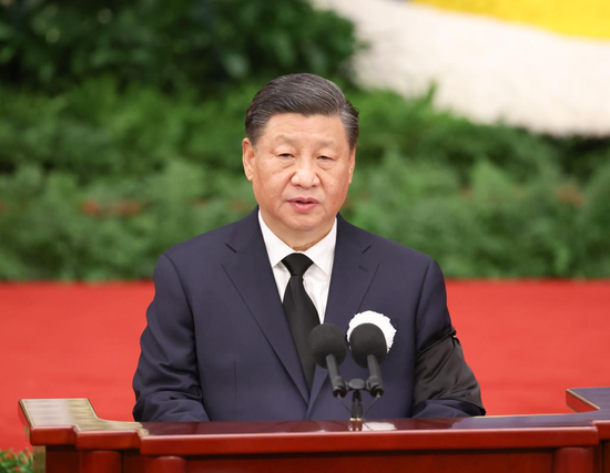 Xi Jinping, general secretary of the Communist Party of China (CPC) Central Committee, Chinese president, and chairman of the Central Military Commission (CMC), addresses a memorial meeting for Jiang Zemin, who passed away on Nov. 30 at the age of 96, in the Great Hall of the People in Beijing, capital of China, Dec. 6, 2022. The meeting was held by the CPC Central Committee, the Standing Committee of the National People's Congress (NPC), the State Council, the National Committee of the Chinese People's Political Consultative Conference (CPPCC), and the CMC. (Xinhua/Pang Xinglei)