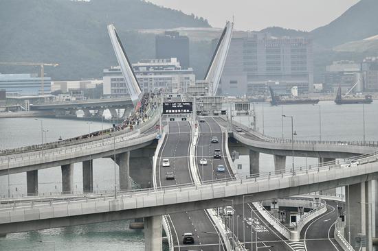 Tseung Kwan O Cross Bay Bridge opens to traffic in Hong Kong