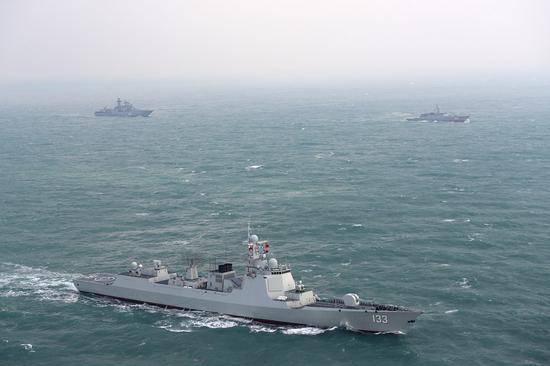 Chinese and Russian warships take part in a joint naval exercise, Joint Sea 2022, in the East China Sea on Dec. 21, 2022.  (Photo by Xu Wei/Xinhua)