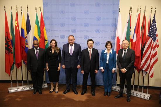 Kazakhstan's permanent representative Akan Rakhmetullin (3rd L) and permanent representatives of the five new UN Security Council members attend a flag installation ceremony at the UN headquarters in New York, on Jan. 3, 2023. (Xinhua/Xie E)