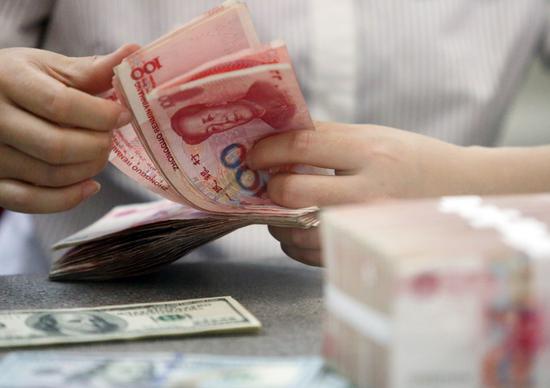 Global investors snatch up Chinese yuan assets amid recovery prospects