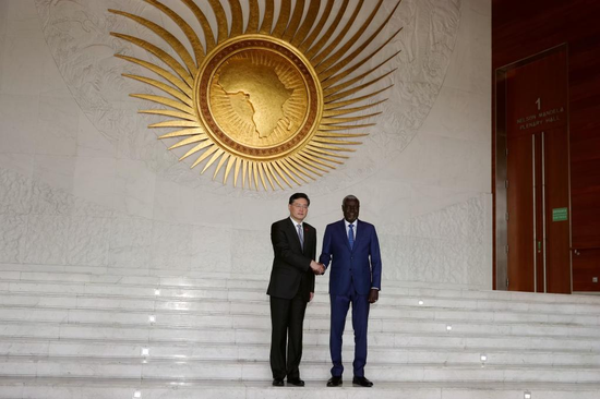 Chinese Foreign Minister Qin Gang (L) shakes hands with African Union (AU) Commission Chairperson Moussa Faki Mahamat after the eighth China-African Union (AU) Strategic Dialogue at the AU headquarters in Addis Ababa, Ethiopia, on Jan. 11, 2023. (Xinhua/Wang Ping)
