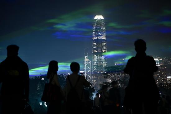 Art show illuminates Hong Kong's night sky