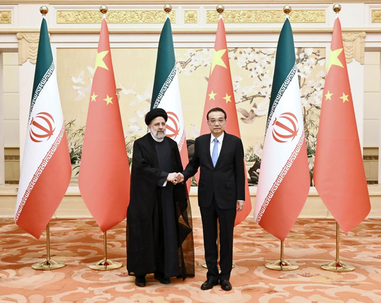 Chinese Premier Li Keqiang meets with visiting President of the Islamic Republic of Iran Ebrahim Raisi at the Great Hall of the People in Beijing, capital of China, Feb. 14, 2023. (Xinhua/Yan Yan)