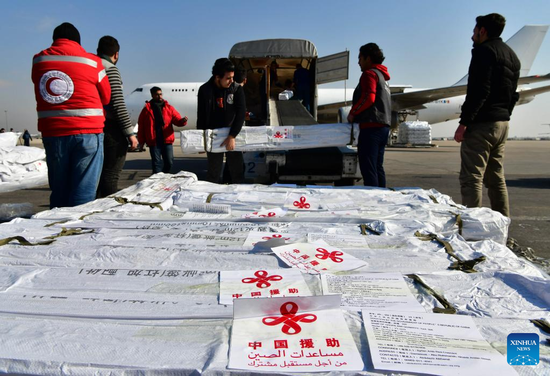 A batch of humanitarian aid from China arrives at Damascus international airport in Damascus, capital of Syria, on Feb. 15, 2023. (Photo by Ammar Safarjalani/Xinhua)