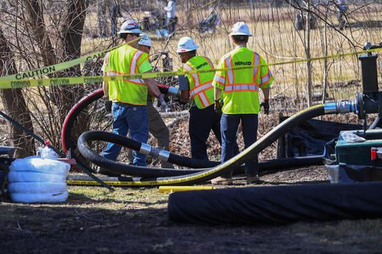Clean-up efforts continue on site of toxic train derailment in Ohio
