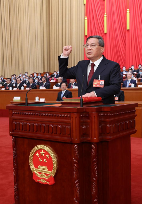 Newly appointed Chinese Premier Li Qiang makes a public pledge of allegiance to the Constitution at the Great Hall of the People in Beijing, capital of China, March 11, 2023. Li was endorsed as Chinese premier at a plenary meeting of the first session of the 14th National People's Congress, the country's national legislature. (Xinhua/Pang Xinglei)