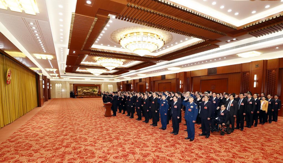 Members of the Standing Committee of the 14th National People's Congress (NPC) pledge allegiance to the Constitution in Beijing, capital of China, March 11, 2023. (Xinhua)