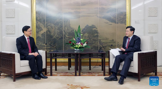 State Councilor and Minister of Foreign Affairs Qin Gang meets with John Lee, chief executive of the Hong Kong Special Administrative Region (HKSAR), in Beijing, capital of China, to exchange their views on diplomatic work related to the HKSAR, March 16, 2023. (Xinhua)