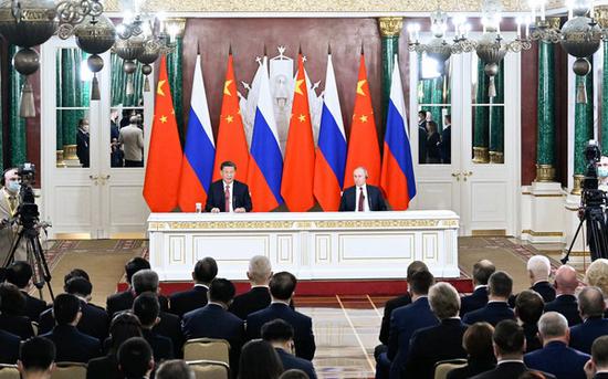 Chinese President Xi Jinping and Russian President Vladimir Putin jointly meet the press
