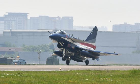 A J-10C fighter jet of the Bayi Aerobatic Team of the Chinese People's Liberation Army Air Force takes off from an airfield after being delivered in spring 2023. (Photo/Courtesy of Aviation Industry Corp of China)