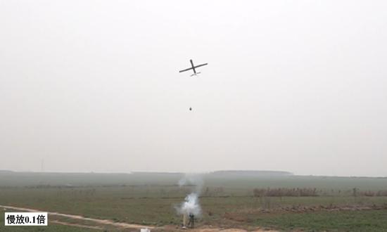 A Peregrine tube-launched folding-wing drone carries out a ground-based launch. (Photo/Screenshot from the WeChat account of China's Northwestern Polytechnical University)