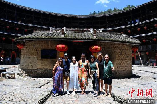 American artists visit Tulou in Nanjing County, Fujian Province, May 30, 2023. (Photo/China News Service)