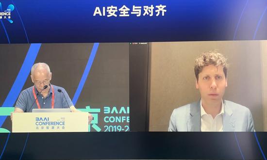 Sam Altman, the CEO of OpenAI (right), delivers an online speech at the conference held by the Beijing Academy of Artificial Intelligence in Beijing on June 10, 2023. (Photo: Shen Weiduo/GT)