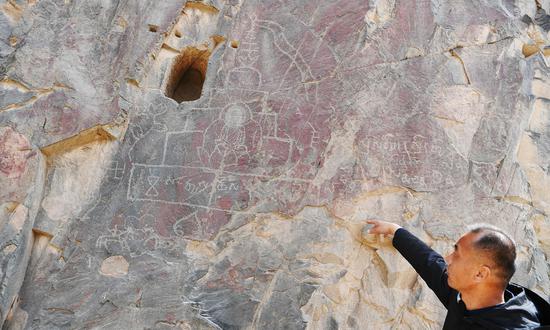 China builds digital image database for 72 petroglyphs