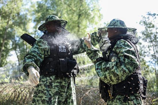Border guards patrol in Xinjiang's 'mosquito kingdom'