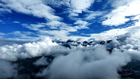 Sea of clouds float over Qilian Mountain