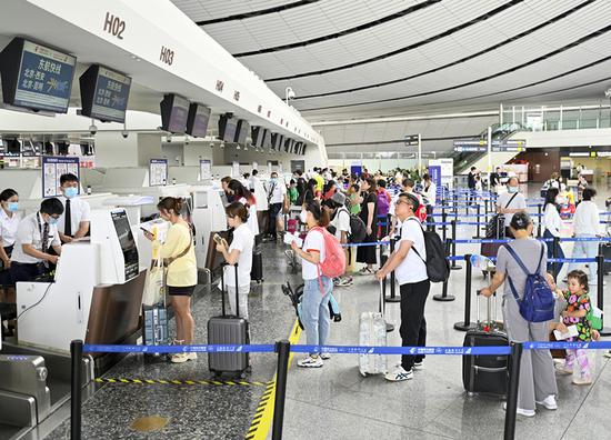 Beijing Daxing airport welcomes summer travel peak