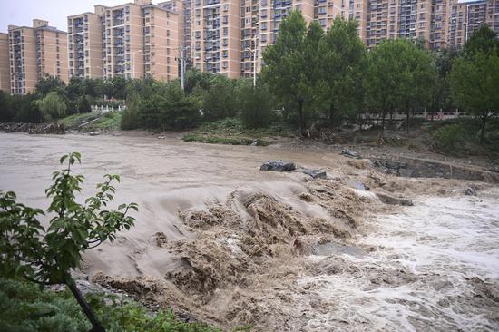Beijing district soaked in continuous rainfall