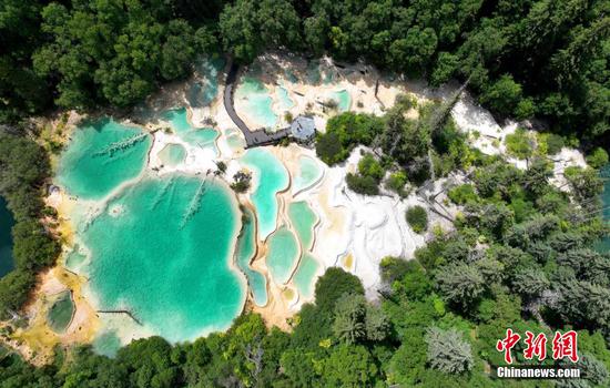 Jade-like Fairy Pool in SW China's scenic spot