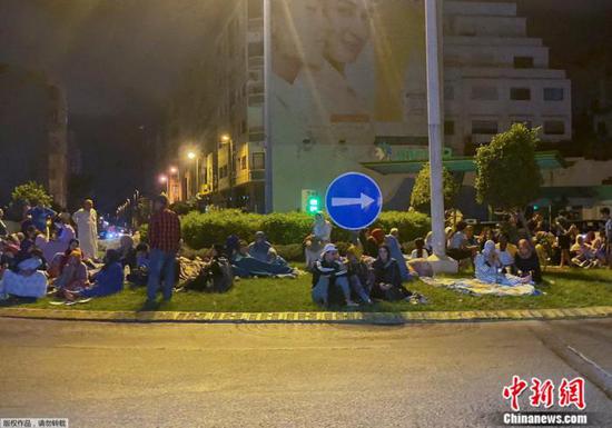 People gather at open space after a 6.9-magnitude that struck Morocco Friday night. (Photo/Agencies)