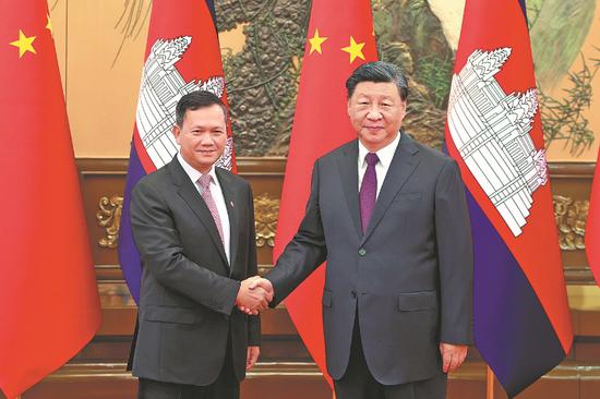 Xi hails 'iron-clad' ties with Cambodia