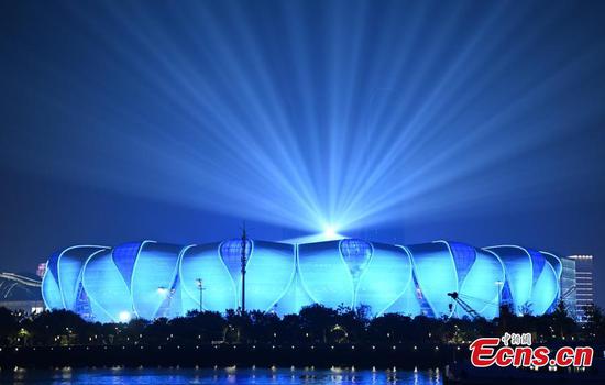 The Hangzhou Olympic Sports Center Stadium, nicknamed "the Big Lotus" and the main stadium for Hangzhou Asian Games, is illuminated during a rehearsal for the opening ceremony of the 19th Asian Games in east China's Zhejiang Province, Sept. 18, 2023. (Photo: China News Service/Wang Gang)