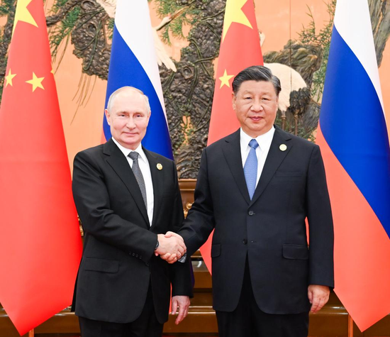 Xi, Putin hold talks in Beijing