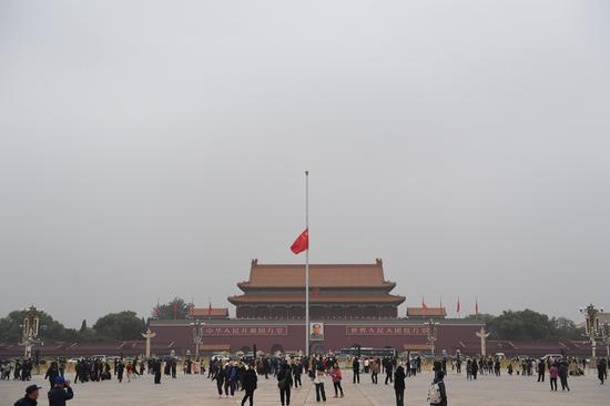 Chinese national flag flies at half-mast to mourn death of Comrade Li Keqiang at Tiananmen Square