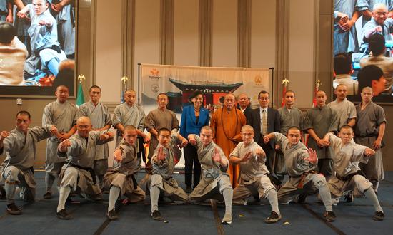 Shi Yongxin (back row, center), Abbot of the Shaolin Temple, poses for a photo with guests and participants of the 2023 North American Shaolin Games in Los Angeles, the US, on November 10, 2023. (Photo/Courtesy of the Shaolin Temple)