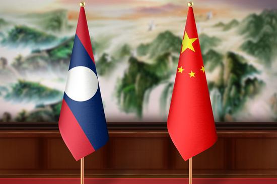 Chinese general meets Laotian president, praises military ties