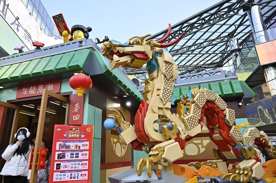 Giant Dragon-themed Lego creations attract visitors in Beijing
