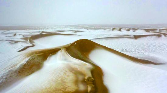 Taklimakan Desert braces for first snow of 2024