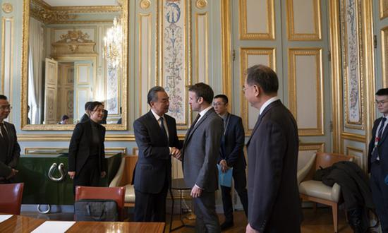 French President Macron meets visiting Chinese Foreign Minister Wang Yi