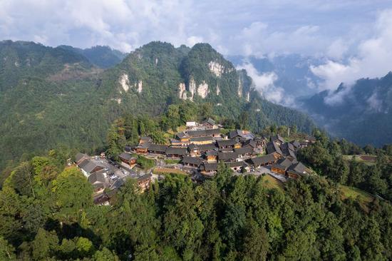 An aerial drone photo taken on Oct. 10, 2023 shows a view of Shibadong Village in Xiangxi Tujia and Miao Autonomous Prefecture, central China's Hunan Province. (Xinhua/Chen Sihan)